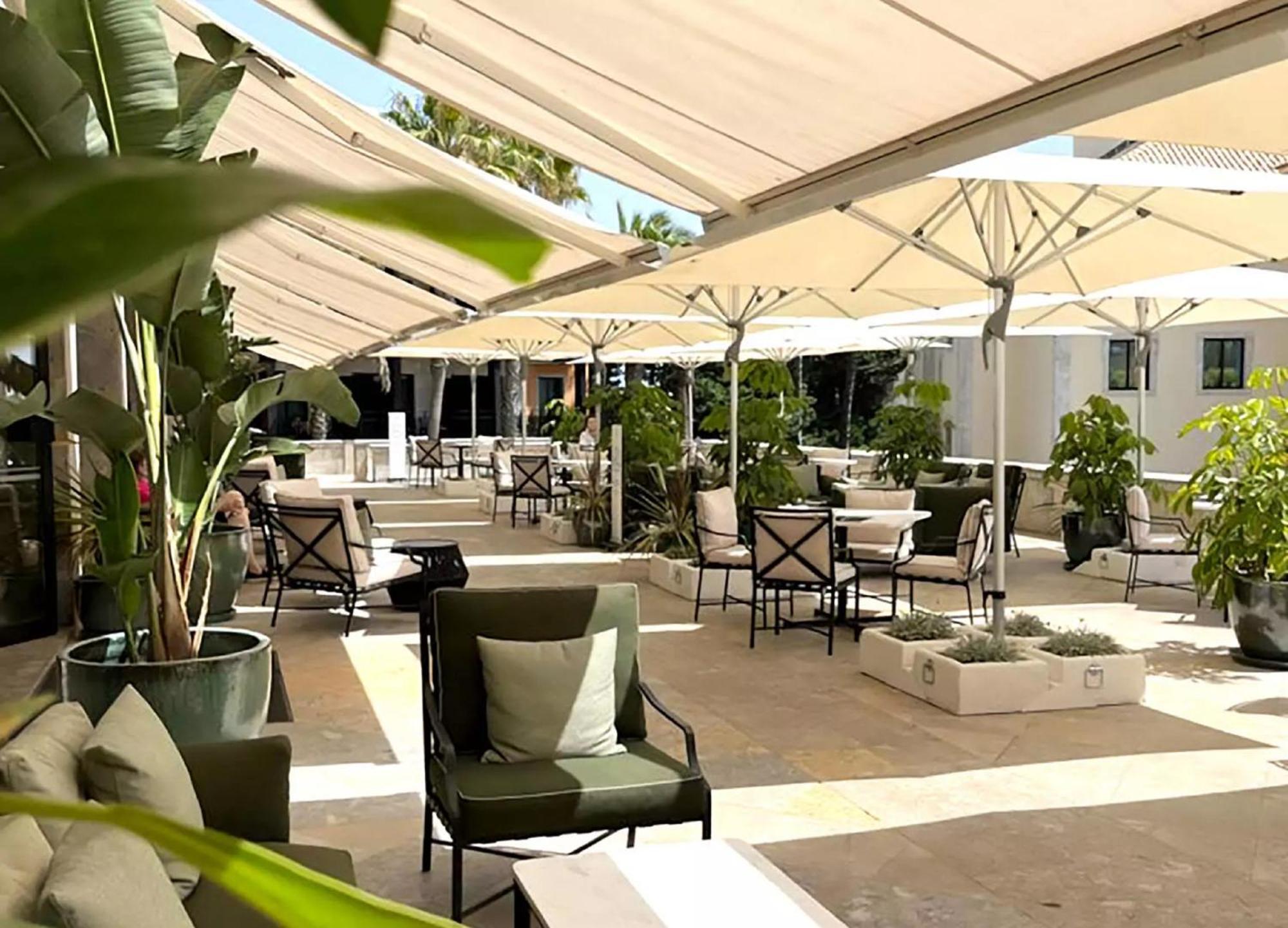 Grande Real Villa Italia Hotel & Spa Кашкайш Екстериор снимка The patio at the Hotel de la Paix